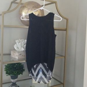 Sleeveless shirt..cross style back